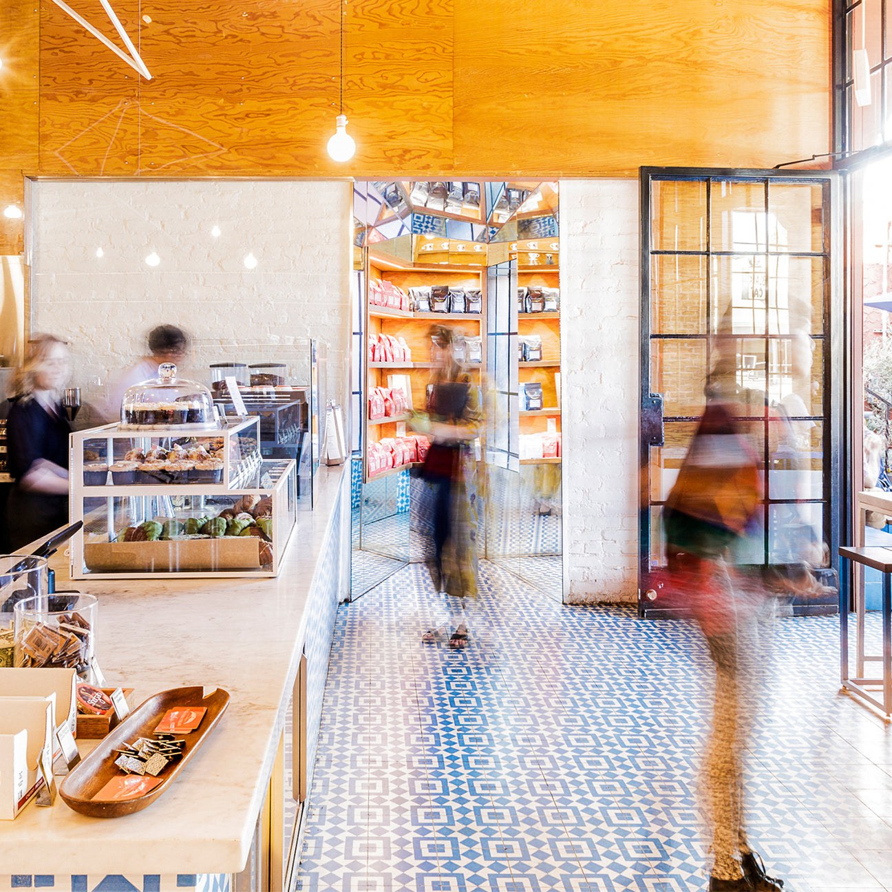 The blue and white tile floor and marble counter at Intelligentsia's Silver Lake Coffeebar